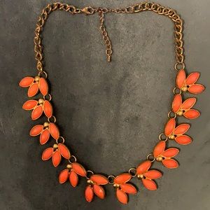 Coral gold tone necklace